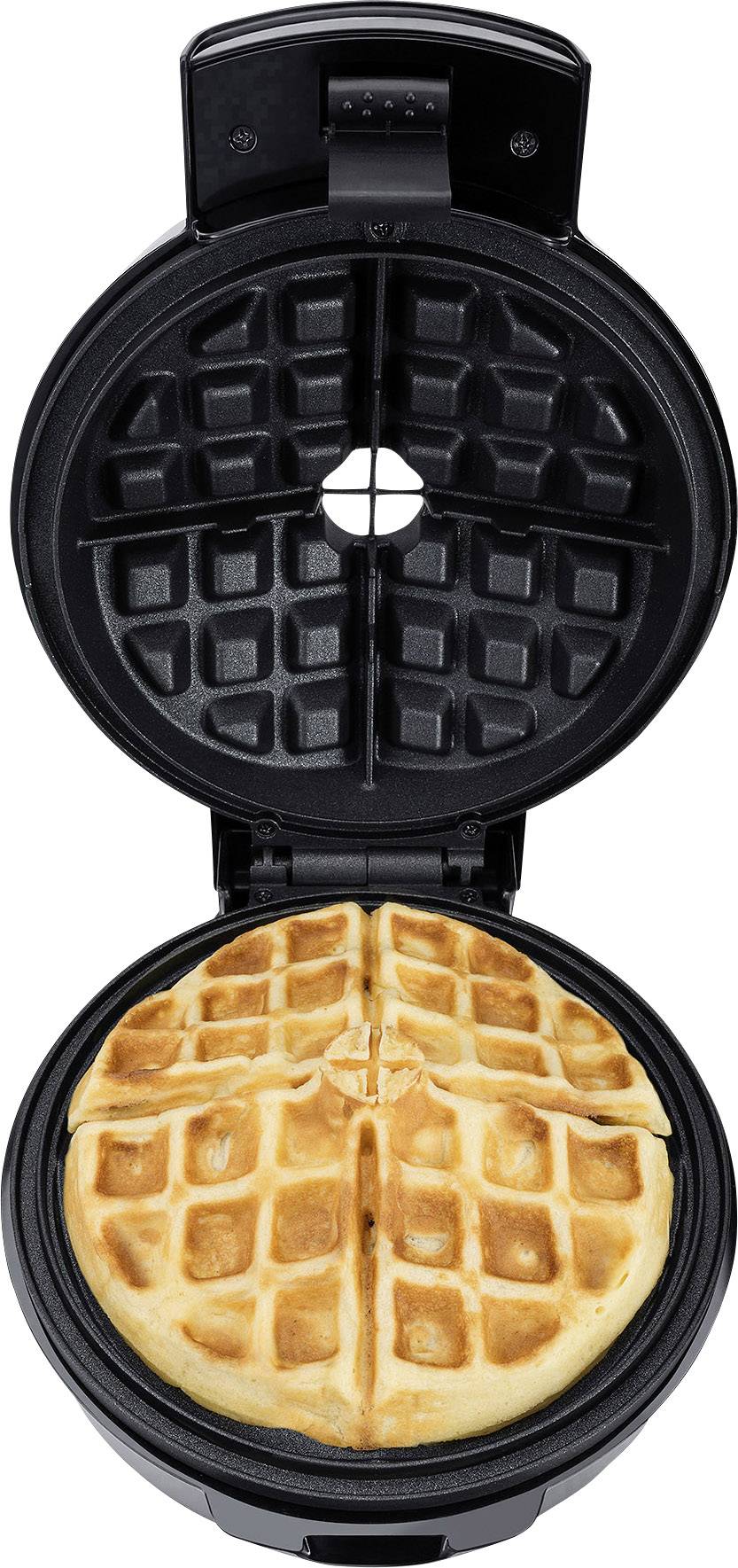 Ein geöffneter Waffeleisen mit einer goldbraun gebackenen Waffel darin, die in vier Abschnitte unterteilt ist.