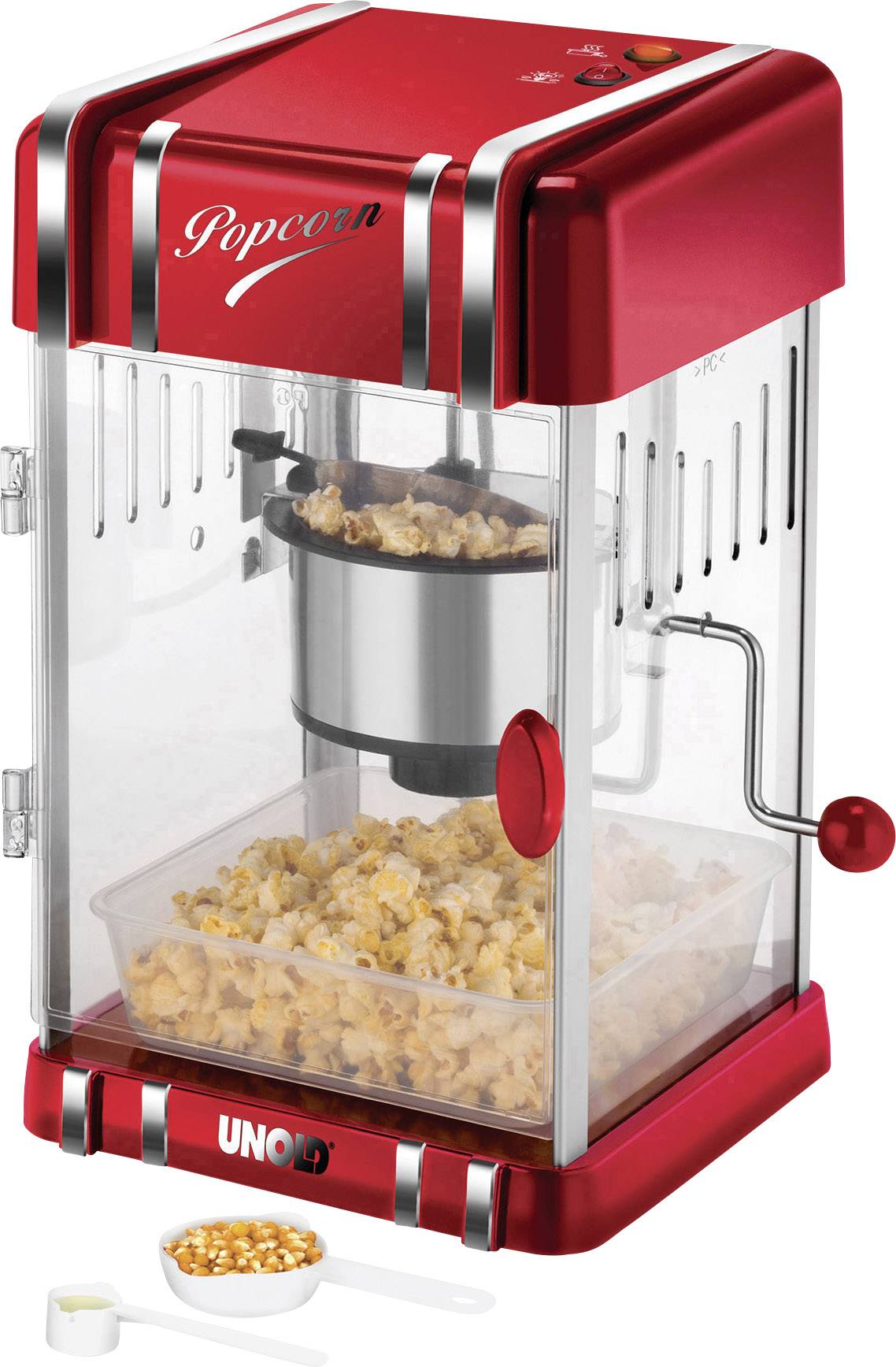 Rot-weiße Popcornmaschine mit Popcorn im Inneren. Kleine Schaufel mit ungepufftem Mais daneben.