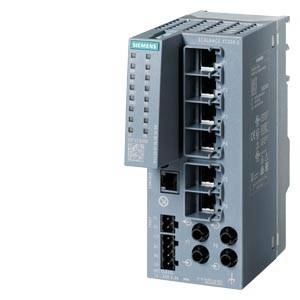 Ein graues Siemens Netzwerkgerät, Modell SCALANCE. Es verfügt über mehrere Ethernet-Ports und eine Stromversorgungsverbindung.