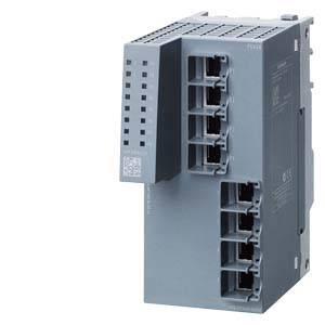 Eine graue elektronische Komponente mit mehreren Anschlüssen und einem Lüftungsgitter, vermutlich Teil eines größeren Gerätes.