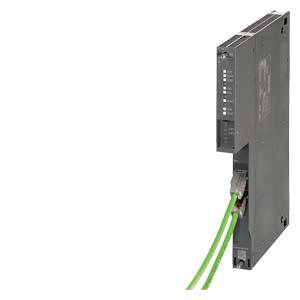 Ein schwarzes elektronisches Gerät mit mehreren grünen Kabeln, das zur Steuerung oder Verbindung in einem technischen System verwendet wird.