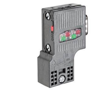 Ein elektrisches Modul mit Schalter und zwei LED-Anzeigen, darunter ein Pfeil. Ein rotes und ein grünes Licht zeigen den Status an.