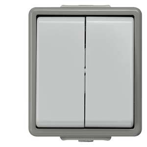 Ein doppelter Lichtschalter mit grauem Rahmen, beide Schalter in der Aus-Position.
