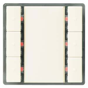 Ein weißer Lichtschalter mit acht seitlichen Knöpfen auf einem rechteckigen Panel, möglicherweise für komplexe Beleuchtungssteuerung.