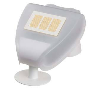 Transparenter Kunststoffbehälter mit Klebepads auf der Oberseite, geeignet für Kabelmanagement auf glatten Oberflächen.