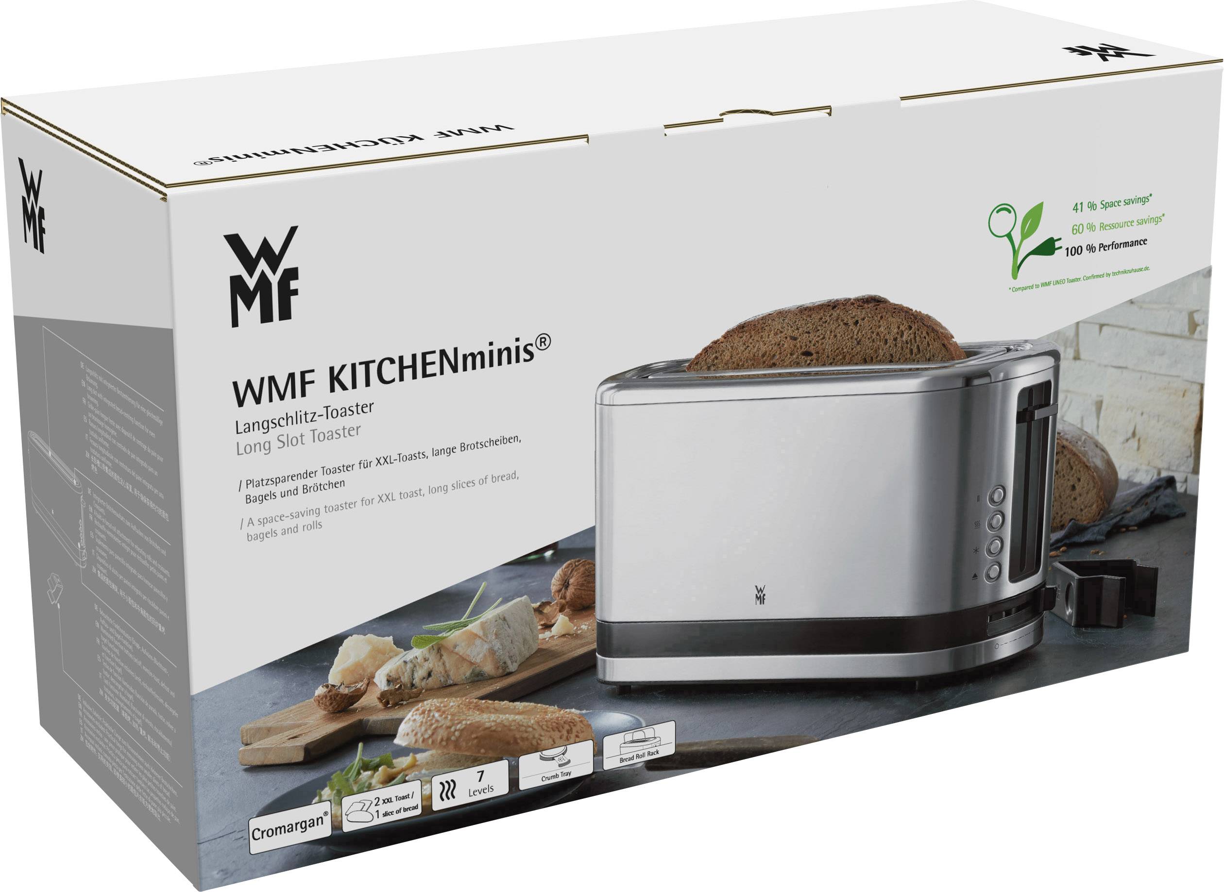 Die Verpackung eines WMF KITCHENminis Langschlitz-Toasters zeigt den Toaster selbst und Brotscheiben. Gekennzeichnet mit Energiesparhinweis.
