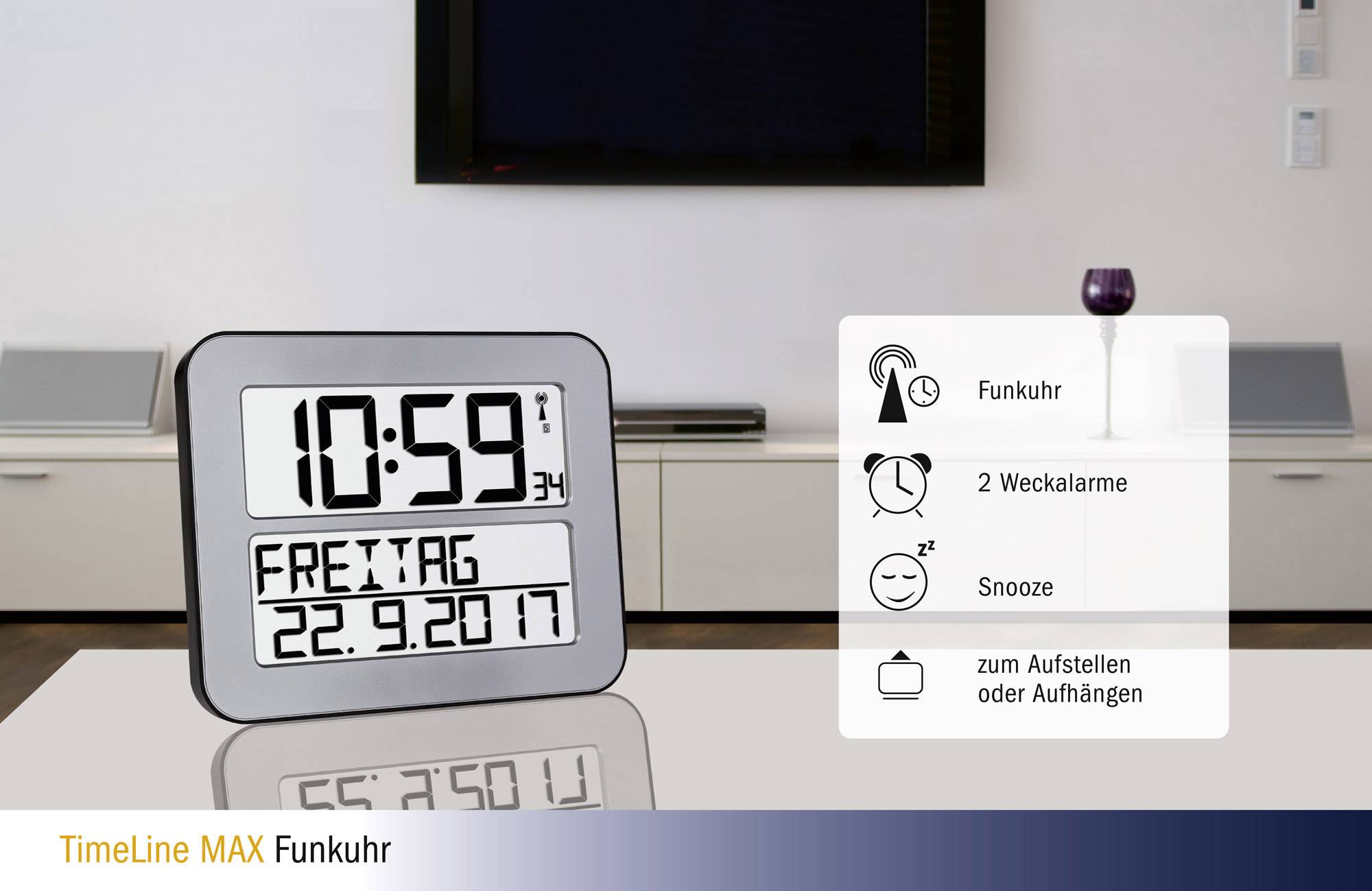 Digitale Funkuhr mit großer Anzeige. Zeigt Uhrzeit 10:59, Datum Freitag, 22.9.2017. Funktionen: Funkuhr, 2 Weckalarme, Snooze.