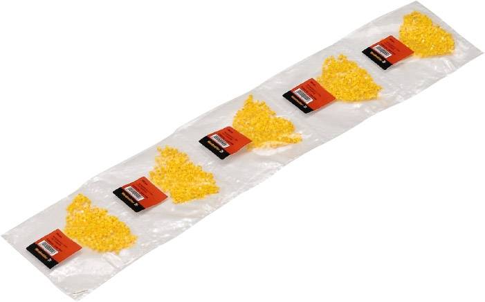 Kunststoffstück mit sechs gleichmäßig verteilten Abschnitten aus gelbem Granulat und schwarzen Etiketten auf einer durchsichtigen Folie.