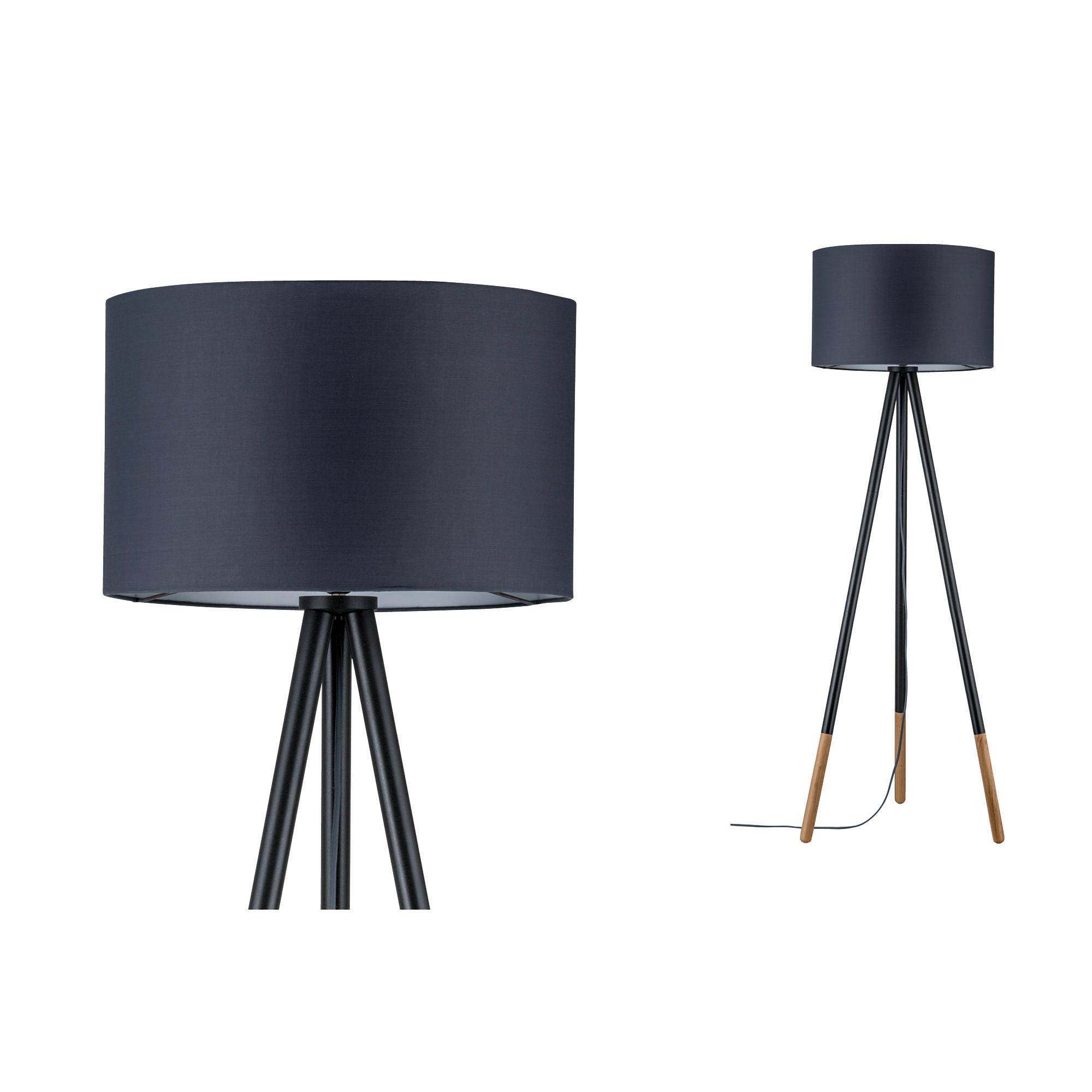 Stehlampe mit dreibeinigem Gestell und schwarzem Schirm, daneben Tischlampe im gleichen Design. Modernes, minimalistisches Design.