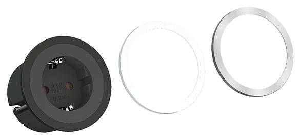 Schwarze Steckdose mit zwei austauschbaren Abdeckungen in Weiß und Silber, geeignet für den Einbau in Möbel oder Wände.