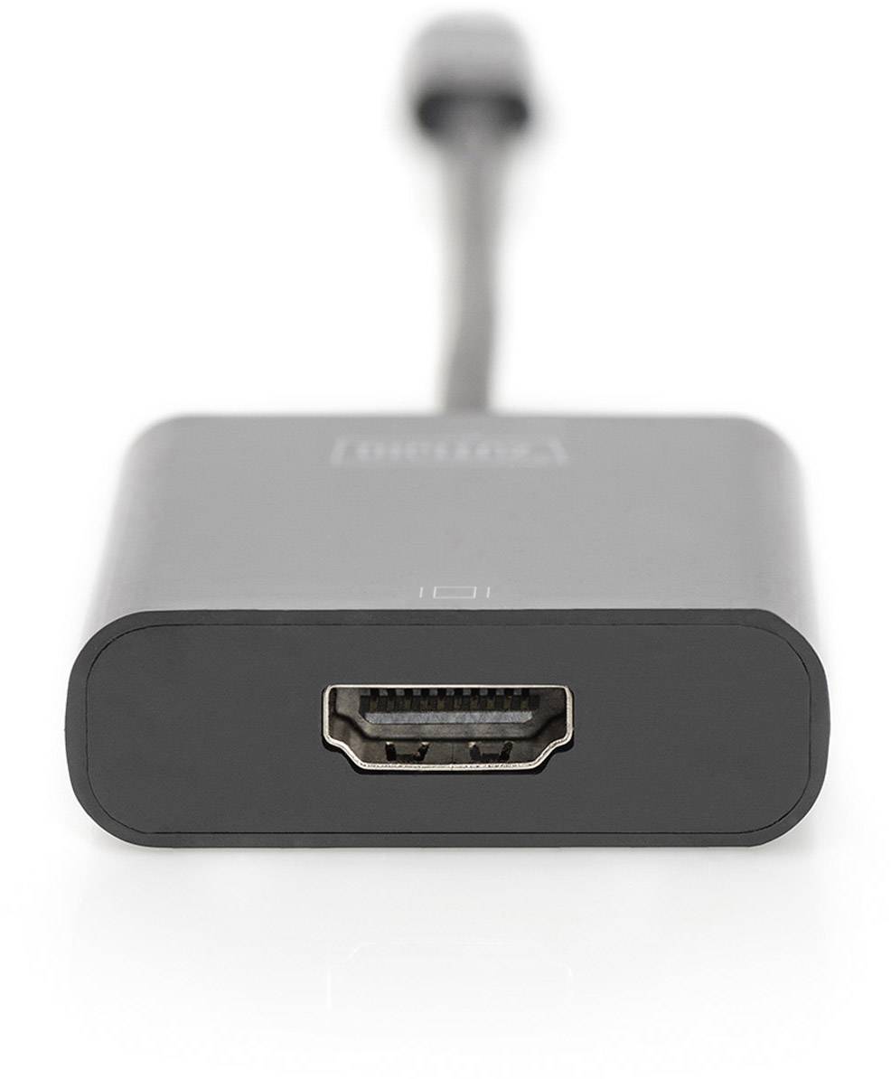 Ein schwarzer HDMI-Adapter mit einer HDMI-Buchse und einem kurzen Kabel, das in einem anderen Anschluss endet, auf weißem Hintergrund.