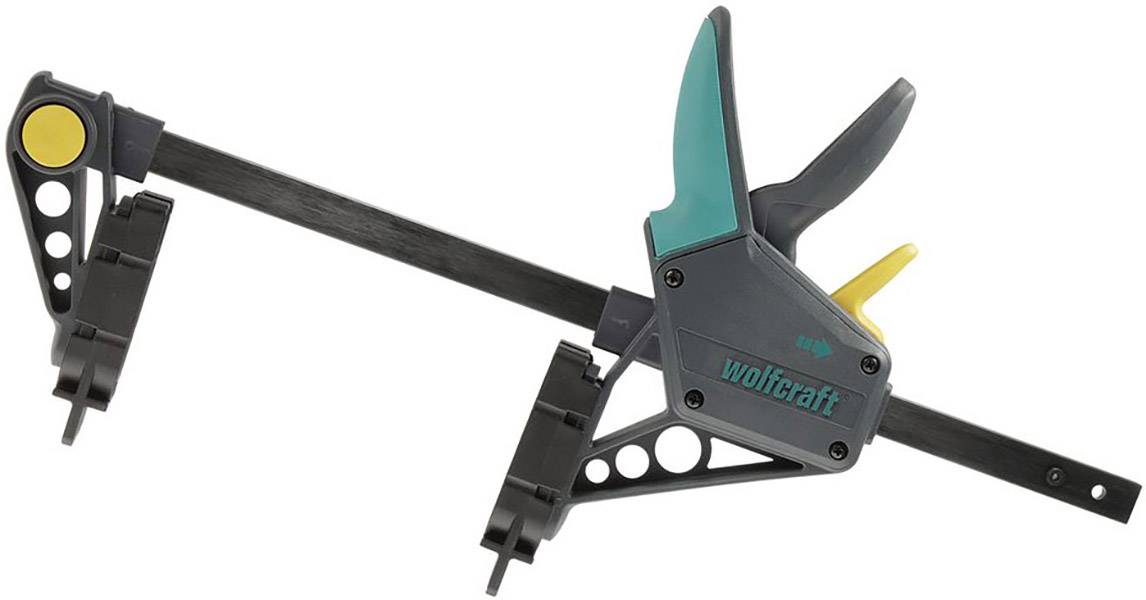 Schnellspannzwinge mit schwarzem Stab, grünem Griff und gelbem Hebel, geeignet für Holzbearbeitung und Werkstattarbeiten.