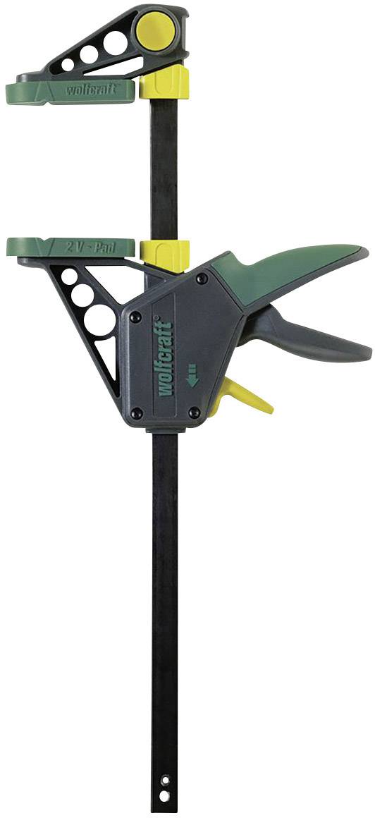 Ein grüner und gelber Schraubzwinge, gekennzeichnet mit 'Woodcraft'. Sie hat einen langen, schwarzen Metallstab und ist in geöffneter Position.