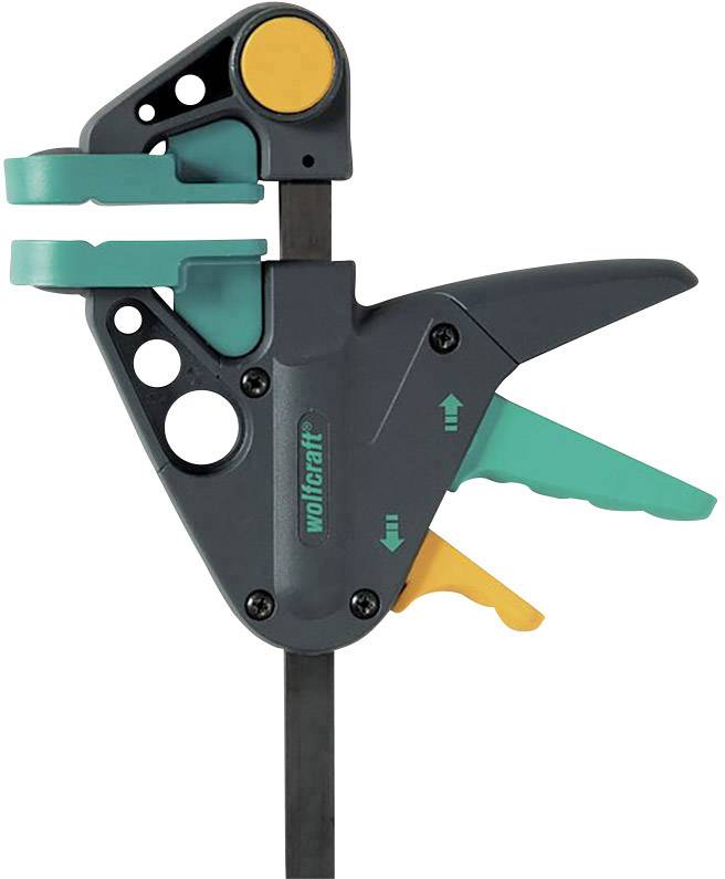 Eine graue Einhandzwinge mit grünem und gelbem Griff, geeignet zum Fixieren von Werkstücken. Markenname 'wolfcraft' sichtbar.