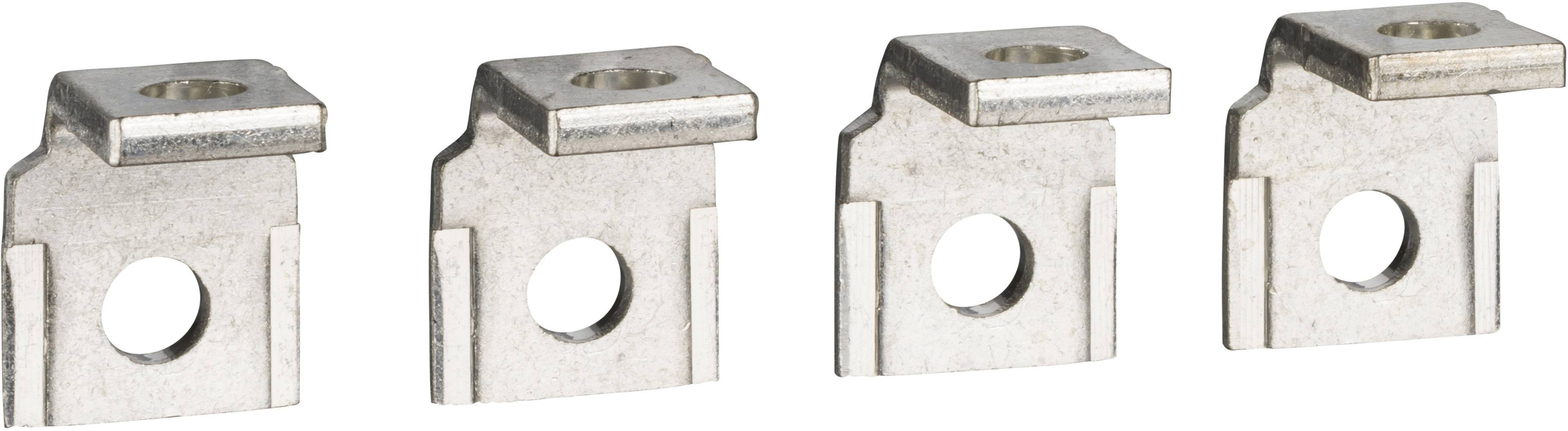 Vier identische, rechtwinklige Metallwinkel mit quadratischer Oberseite und Loch in der Mitte. Sie sind aus glänzendem Metall gefertigt.