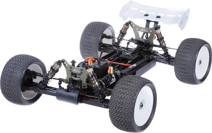 RC-Auto mit großen Reifen und Spoiler, ohne Karosserie; zeigt interne Mechanik, Federung und Kabel.