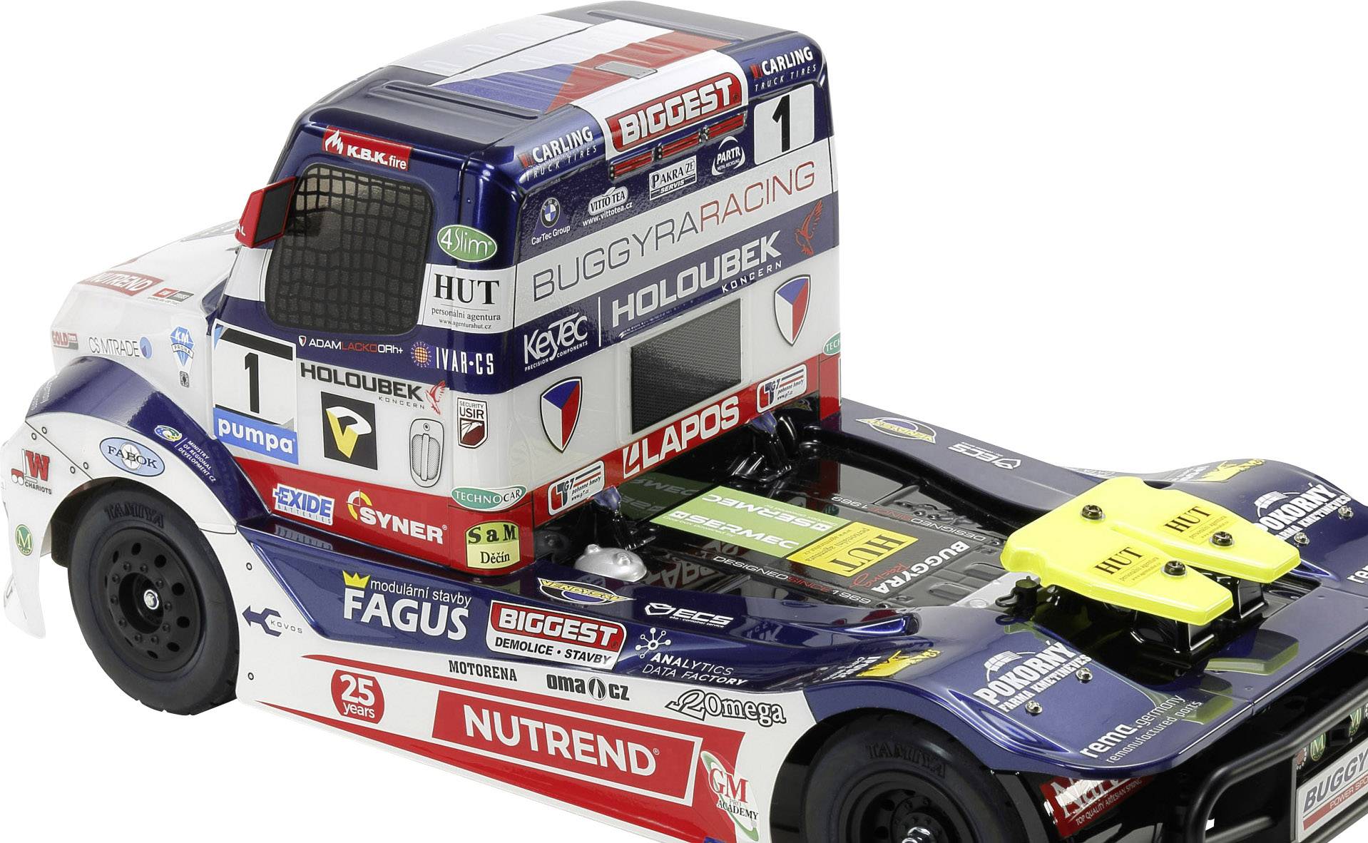 Ein Modell eines Renntrucks mit blauer, roter und weißer Lackierung. Zahlreiche Sponsorenlogos sind auf dem Fahrzeug angebracht.