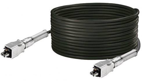 Ein langes, aufgerolltes schwarzes Kabel mit silbernen Steckern an beiden Enden, wahrscheinlich für Daten- oder Stromverbindung.