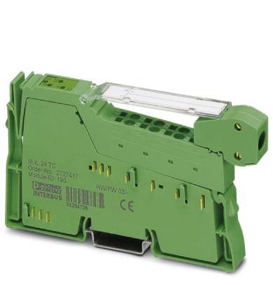 Ein grünes elektrisches Steckmodul mit mehreren Anschlüssen und einem transparenten Schutzgehäuse, verwendet für industrielle Anwendungen.