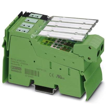 Grünes elektrisches Modul mit mehreren Steckplätzen, beschriftet mit 'IBS S5'.