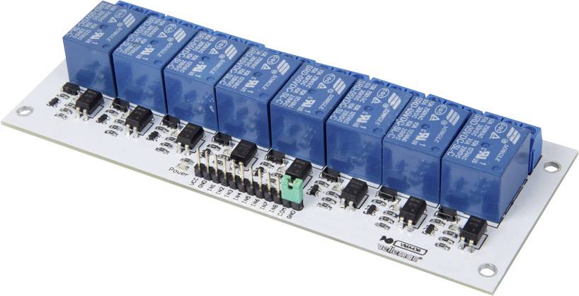 'Relaismodul mit 8 blauen Relais' auf einer weißen Platine; verbindet Schalteingänge mit Lastausgängen.