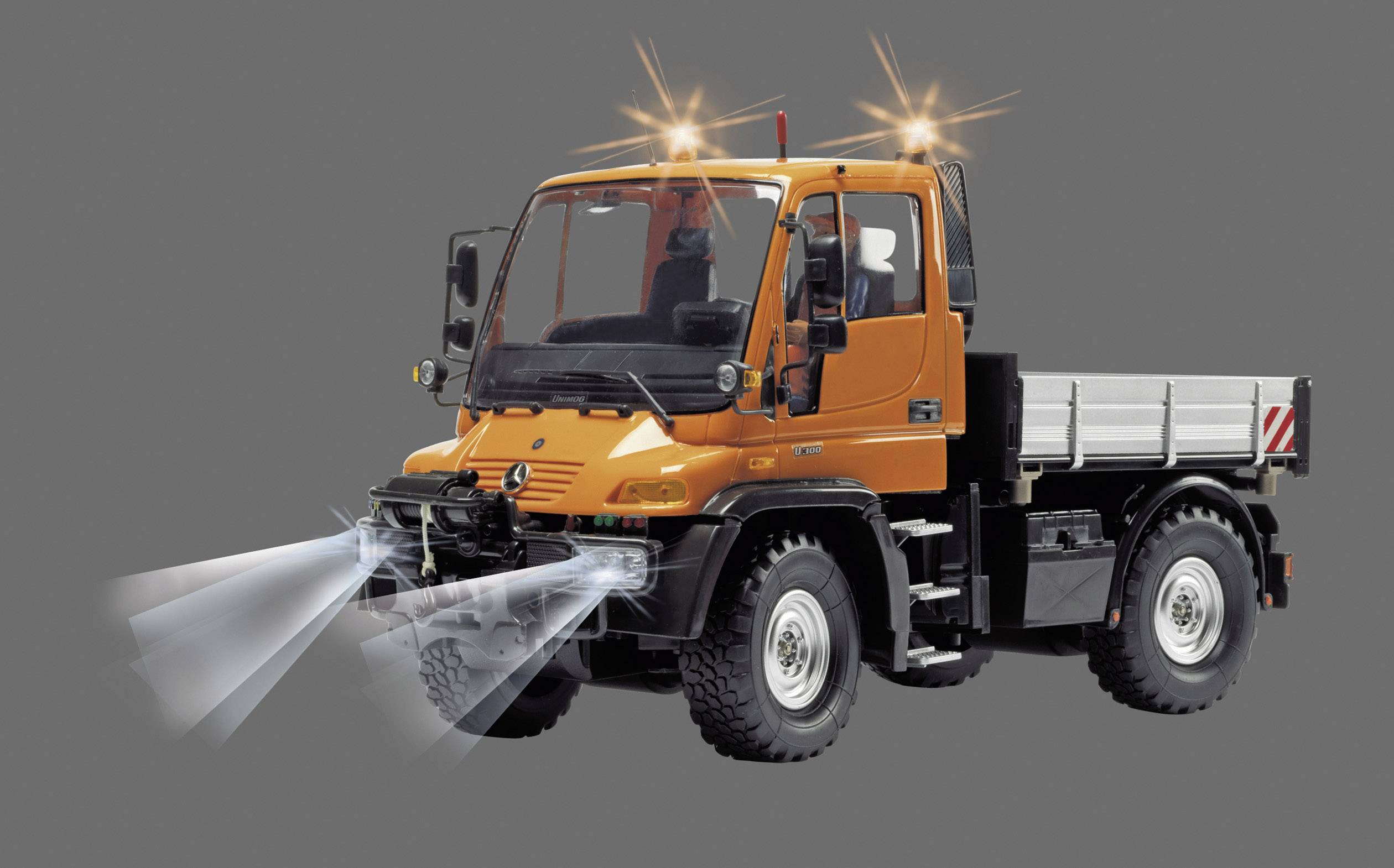 Carson Modellsport Unimog Mercedes Benz U300 Bauhof 1:12 RC Einsteiger Funktionsmodell Baufahrzeug inkl. Akku, Ladegerät und