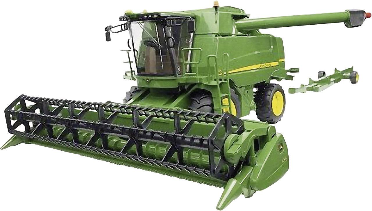 Grüner Mähdrescher mit breitem Schneidwerk und großem Entleerungsrohr. Eignet sich zum Ernten von Getreidefeldern.