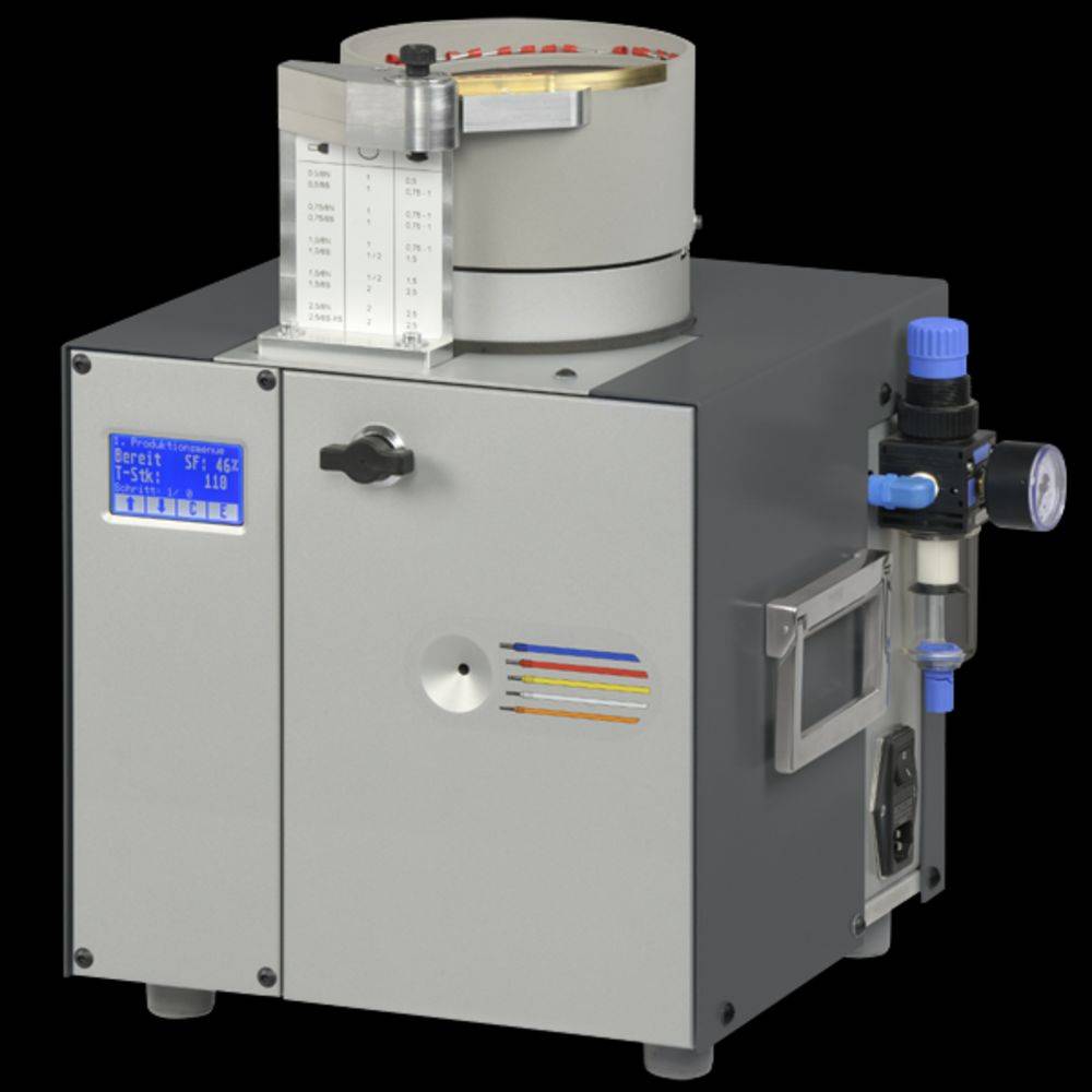 Eine elektronische Präzisionsmaschine mit digitalem Display und Bedienknöpfen zur Steuerung industrieller Prozesse.