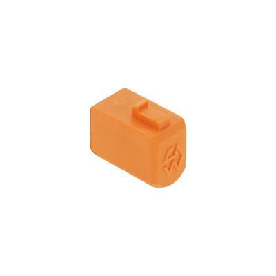 Orange Plastikblock mit strukturiertem Symbol an der Seite; könnte Teil eines größeren Baukastens oder Moduls sein.
