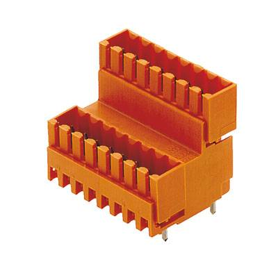 Ein orangefarbener, rechteckiger Steckverbinder mit mehreren Stiften, geeignet für elektronische Anwendungen.