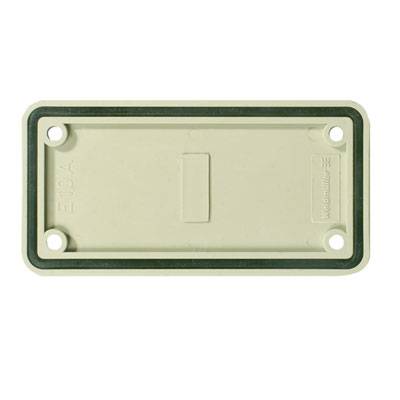 Rechteckige, beige Kunststoffabdeckung mit schwarzem Rand und vier Schraubenlöchern an den Ecken.