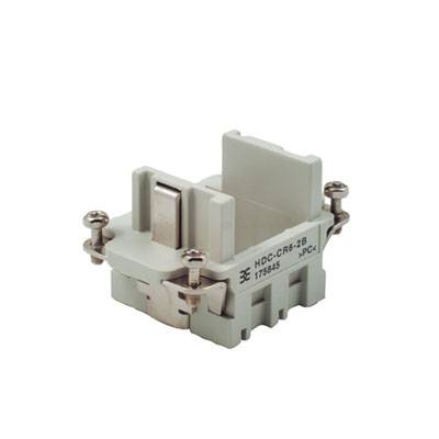 Ein grauer Kunststoffstecker mit zwei Schrauben, ein HDC-CR6-2B, in seitlicher Ansicht.