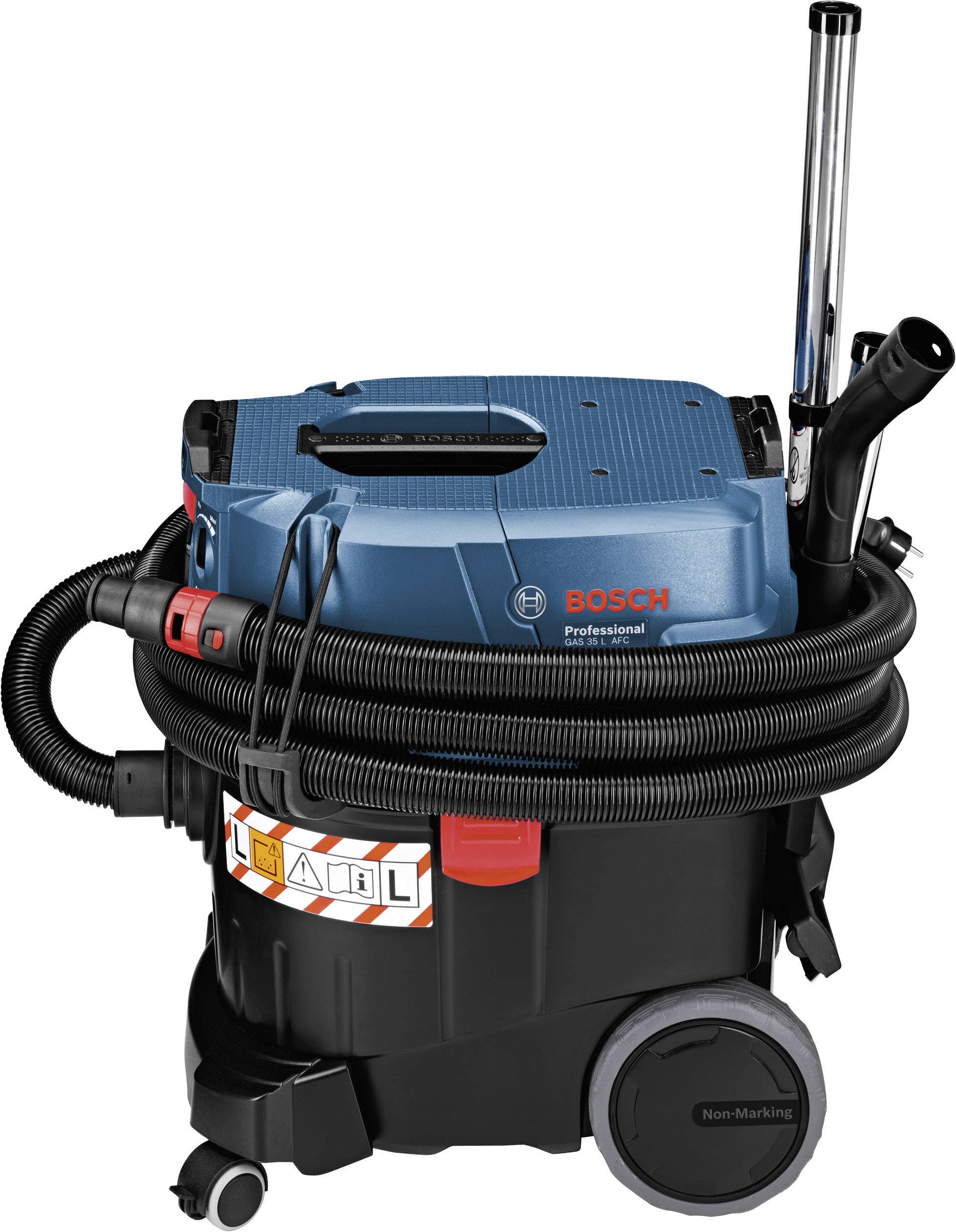 Industriestaubsauger mit blauem Gehäuse, Schlauch und Zubehör. Markenlogo und Modellnummer sind sichtbar. Auf Rollen bewegt.