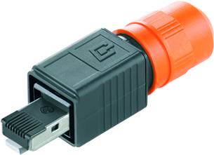 Ein schwarzer und orangefarbener mechanischer Steckeradapter mit Rillen und einem Symbol auf der Oberseite.