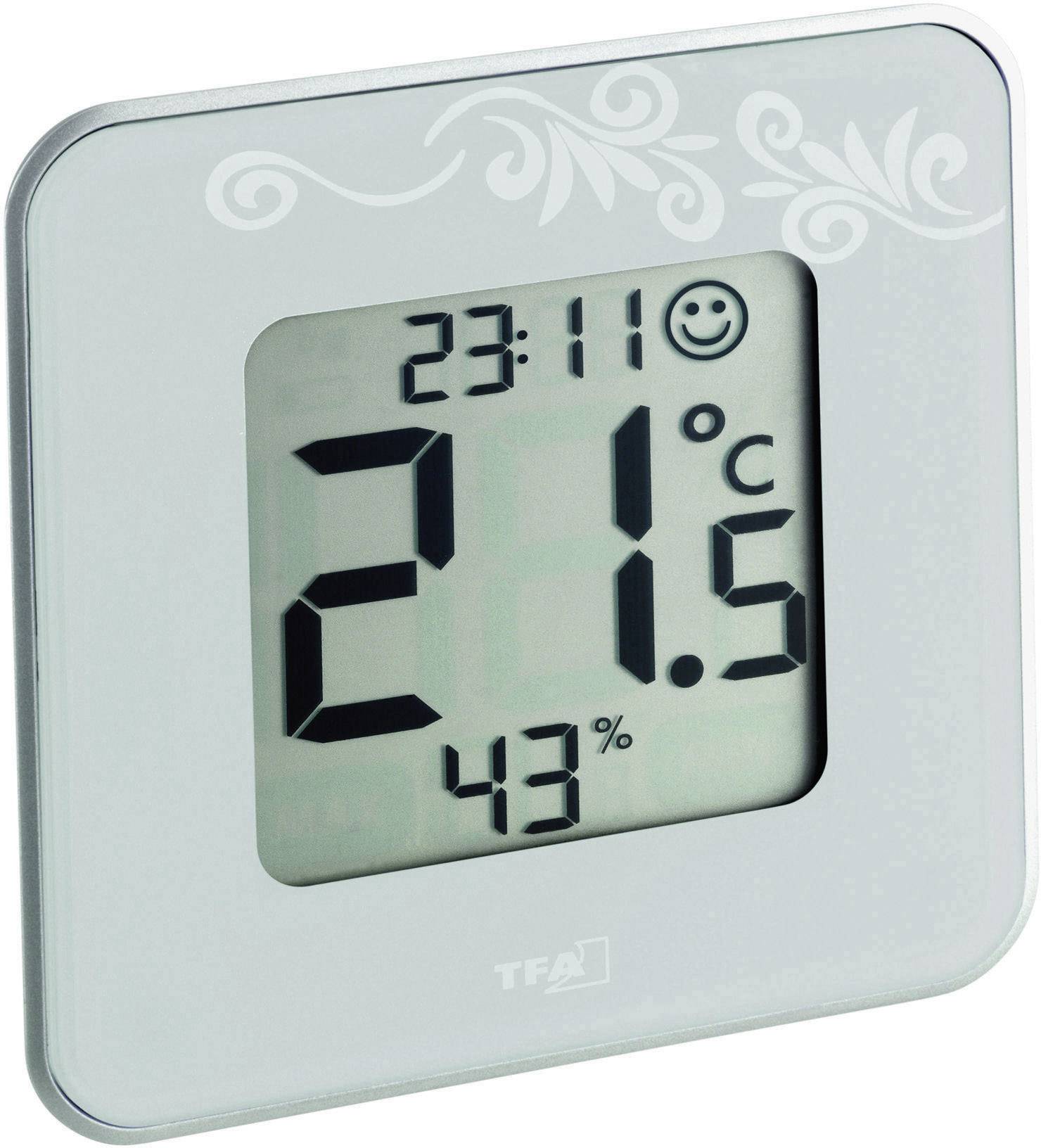Elektronisches Thermometer und Hygrometer zeigt 23:11 Uhr, 21,5 Grad Celsius und 43% Luftfeuchtigkeit an. Smiley-Symbol oben rechts.