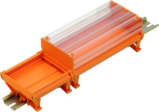 Oranger Plastikverbinder mit durchsichtigem Deckel, geeignet zum sicheren Verbinden von Kabeln oder Leitungen.