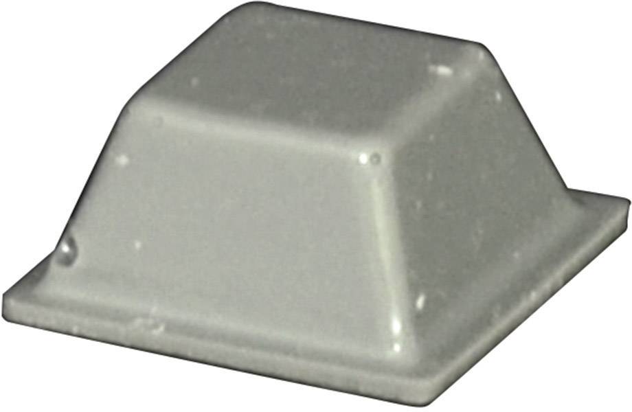Graue Plastiktaste in trapezförmiger Form, oft auf Tastaturen verwendet.