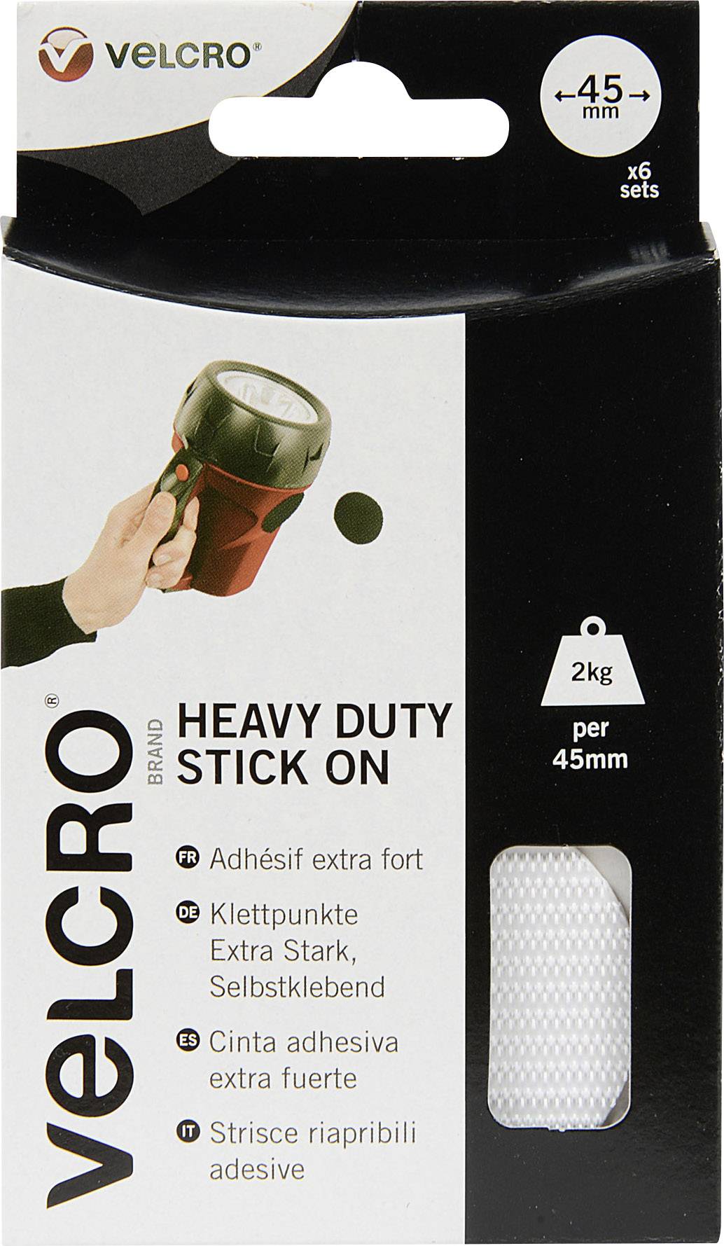 Verpackung eines VELCRO-Markenklettverschlusss mit dem Aufdruck 'Heavy Duty Stick On'. Ein aufgeklebter Punkt wird hervorgehoben.