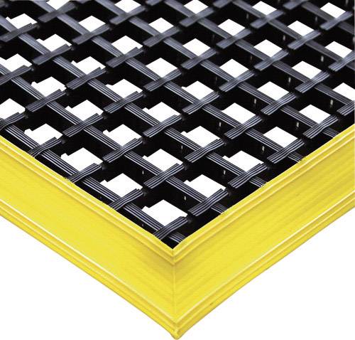 Schwarzes Gitter mit rutschfester Oberfläche und gelbem Rand, das zur Sicherheit und Abgrenzung auf Böden verwendet wird.