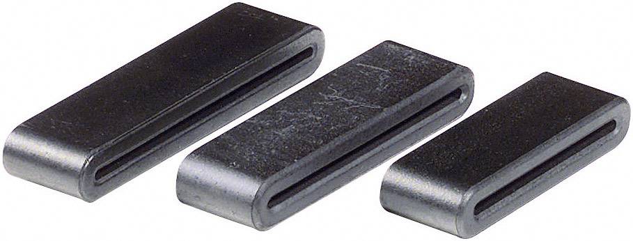 Drei schwarze Metallkeile nebeneinander auf weißem Hintergrund, die ähnliche Größen haben.