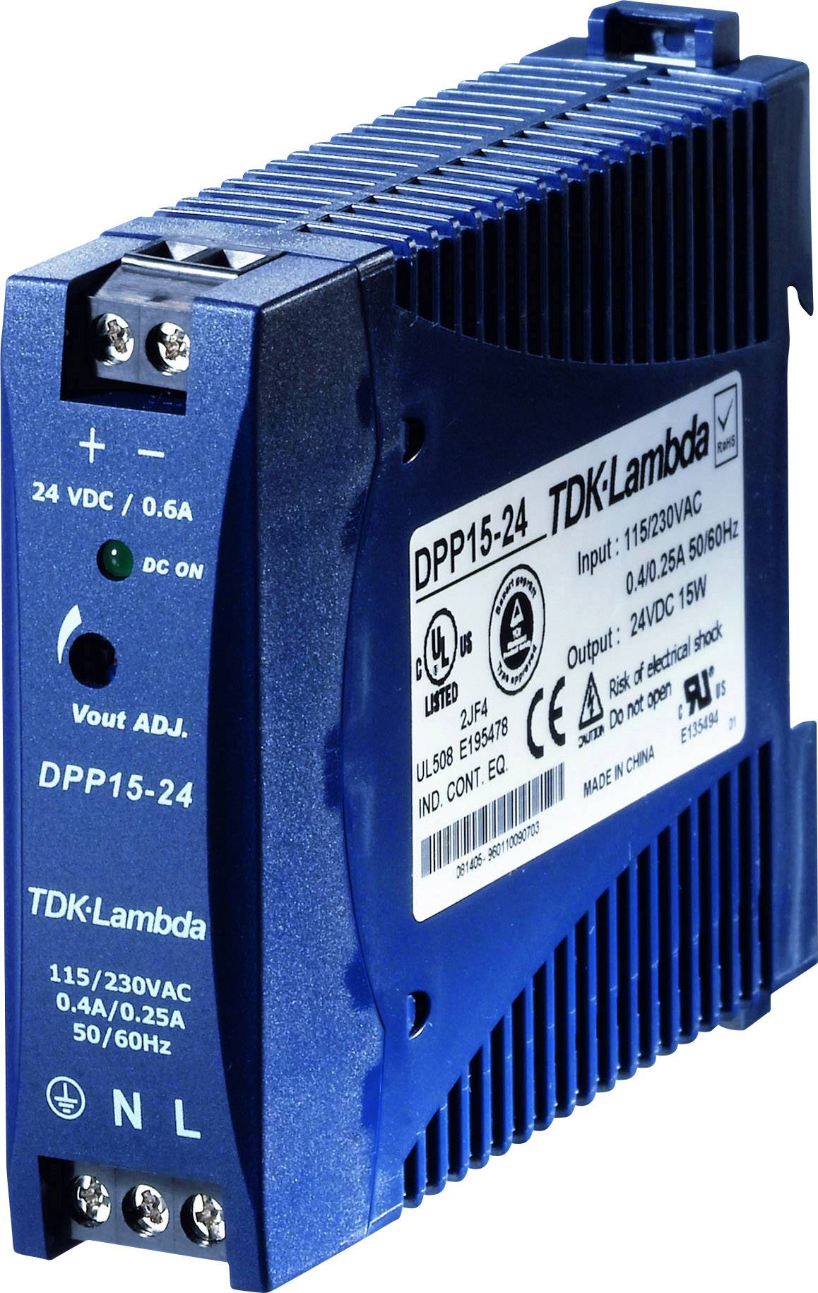 Ein blaues Schaltnetzteil von TDK-Lambda, Modell DPP15-24, mit Angaben zu Stromstärke und Spannung. Geeignet für 24 VDC und 115/230 VAC.