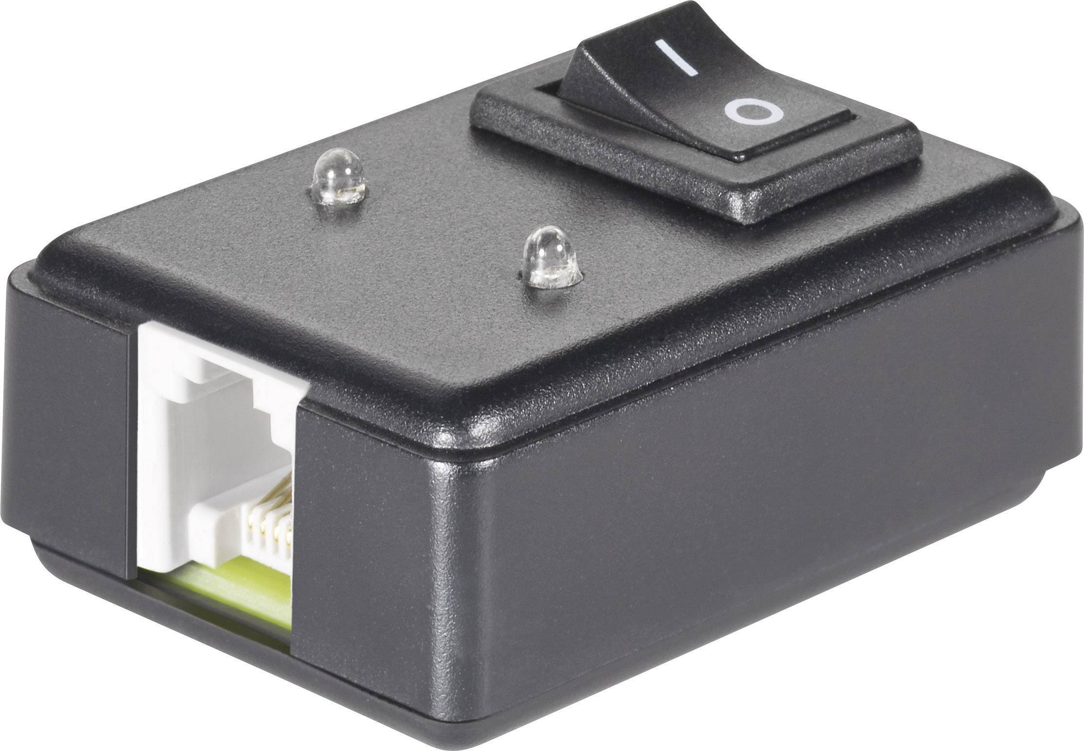 Ein kleiner schwarzer Netzwerkschalter mit einem Kippschalter und zwei LED-Anzeigen. Es hat einen RJ-45-Netzwerkanschluss an der Seite.