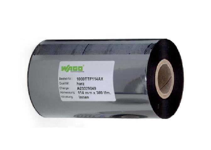 Ein rollbares Etikettenmaterial von WAGO mit den Angaben: Bestellnummer 100DTTF14AX, Material harz, Charge A23329049, Abmessung 114 mm x 360 ft, Innenwicklung.