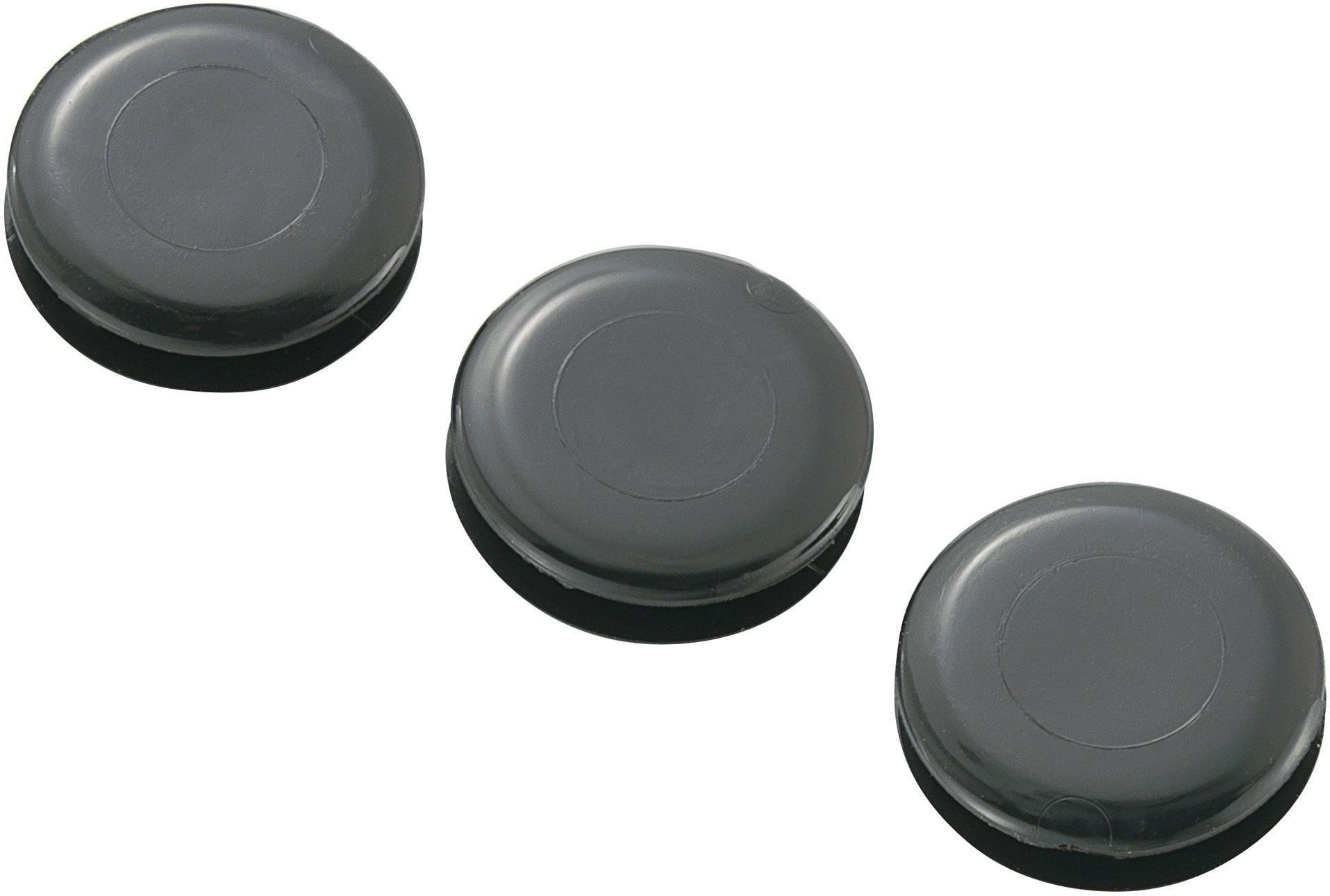 Drei schwarze Eishockey-Pucks auf weißem Hintergrund, diagonal angeordnet.