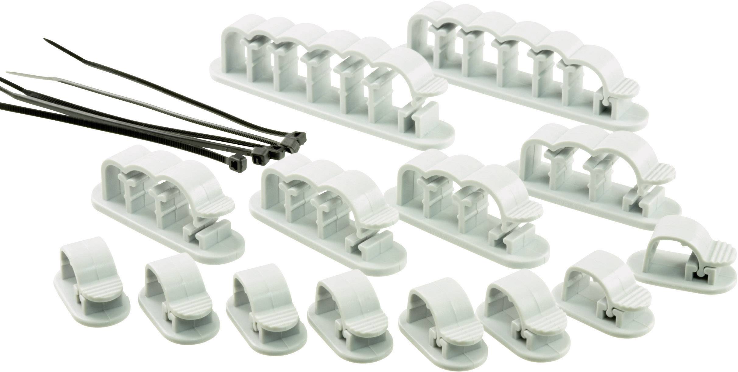 Ein Set aus grauen Kabelhaltern in verschiedenen Größen und schwarzen Kabelbindern zur Organisation von Kabeln.