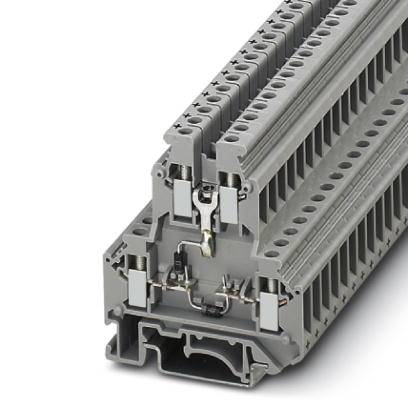 Grauer elektrischer Reihenklemmenblock aus Kunststoff, montiert auf einer Schiene, mit mehreren Anschlüssen für Kabel.