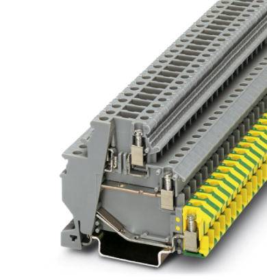 Klemmstein aus Kunststoff mit gelben und grünen Anschlusspunkten, zur elektrischen Verbindung und Sicherung in Schaltschränken.