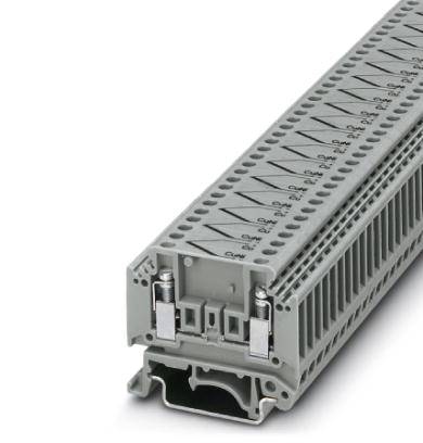 Ein graues industrielles Klemmenmodul mit mehreren Anschlussstellen, verwendet in elektrischen Schaltschränken zur sicheren Verkabelung.