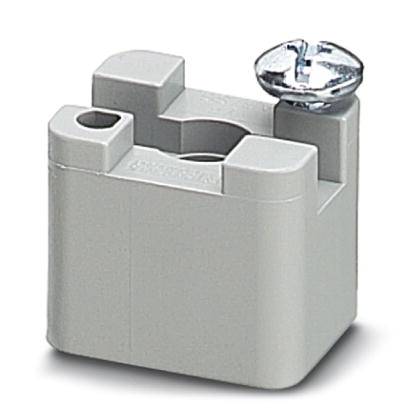 Ein grauer Kabelhalter mit Schraube, zur Befestigung von Kabeln an Oberflächen gedacht.