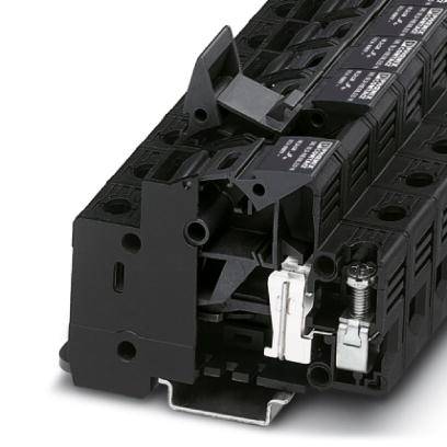 Ein schwarzer elektrischer Sicherungsblock mit mehreren Sicherungen, geeignet für industrielle Anwendungen.